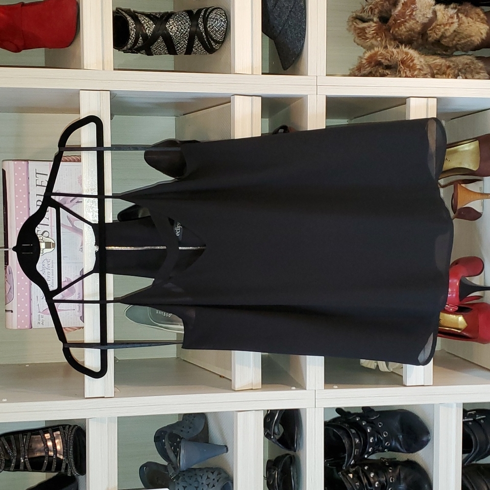 Black sleeveless blouse